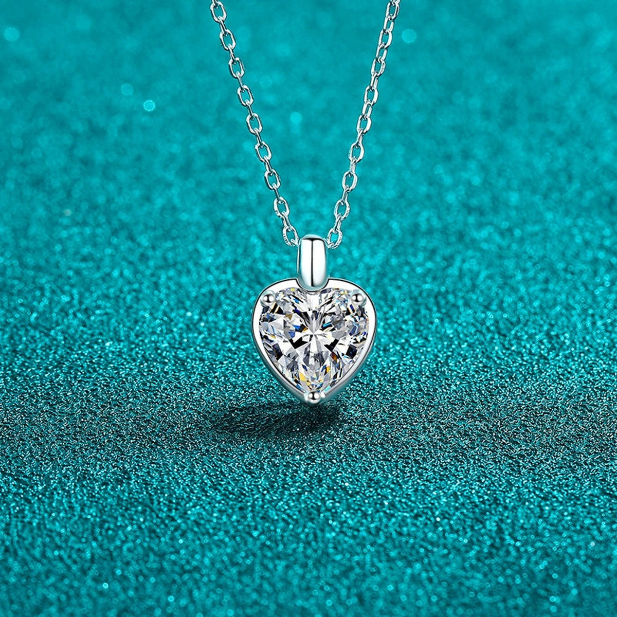 Heart Moissanite Pendant Necklace in Rhodium-Plated S925 sterling silver close-up product scene showing pendant setting