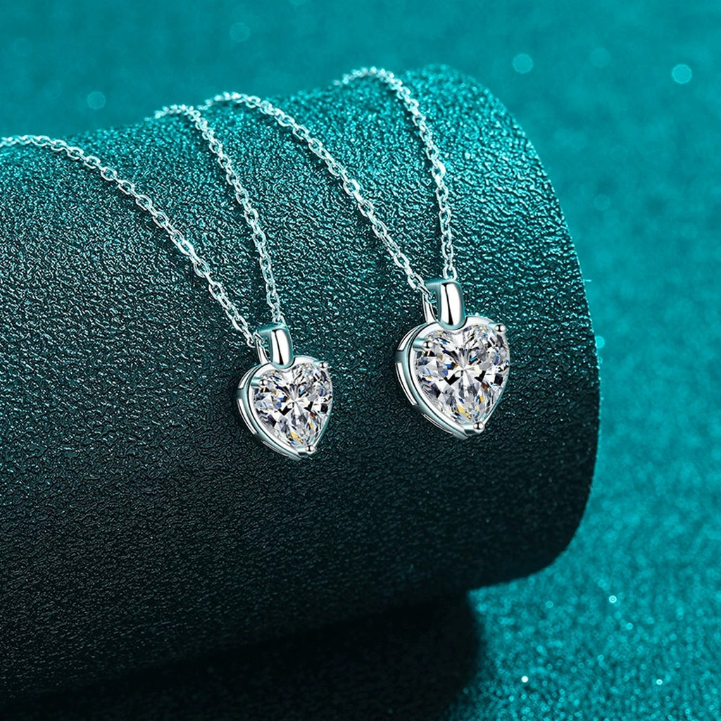 Heart Moissanite Pendant Necklace in Rhodium-Plated S925 sterling silver blue display scene showing chain and stone layout