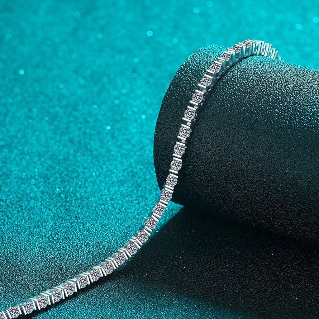 Classic Round Moissanite Tennis Bracelet in Rhodium-Plated S925 sterling silver styled product scene showing stone sparkle and chain detail
