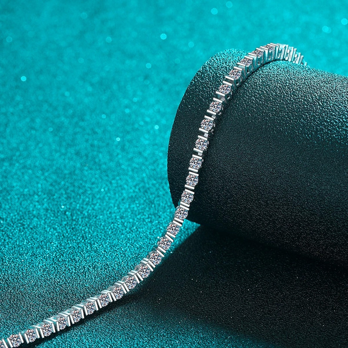 Classic Round Moissanite Tennis Bracelet in Rhodium-Plated S925 sterling silver styled product scene showing stone sparkle and chain detail