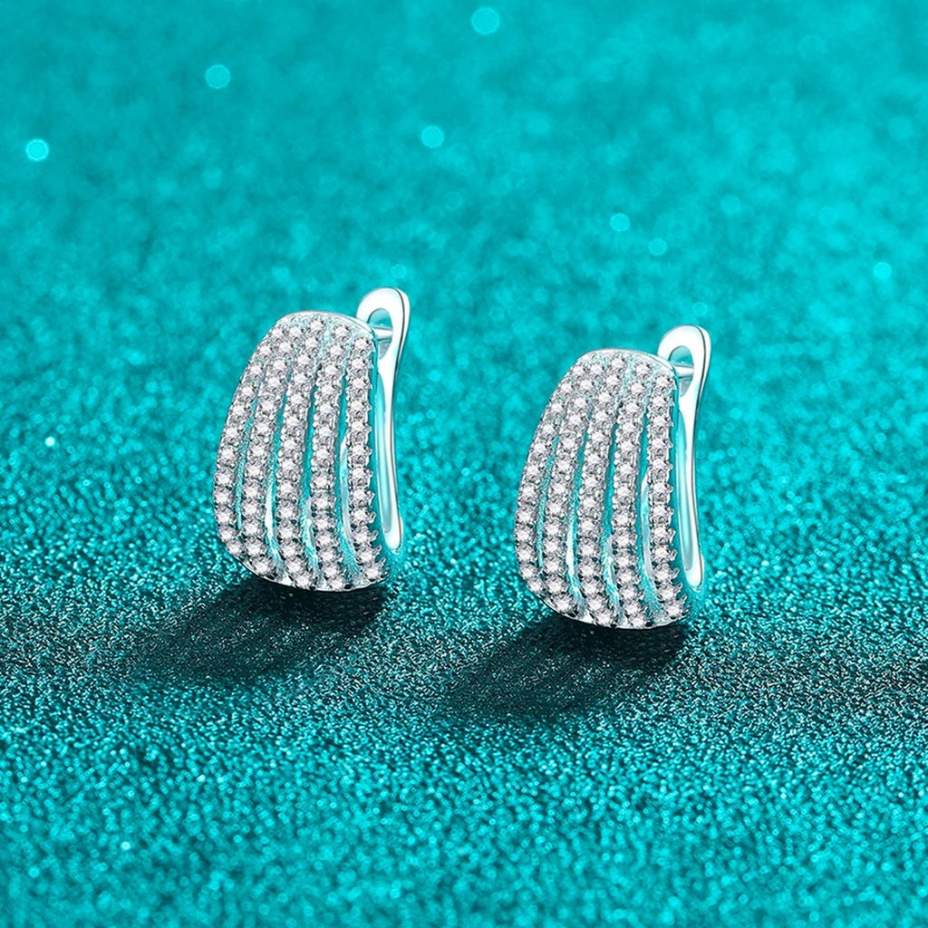 Pave Moissanite Huggie Hoop Earrings in Rhodium-Plated S925 sterling silver product scene view showing angled setting detail