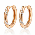 Twisted Pave Moissanite Hoop Earrings in Rhodium-Plated S925 sterling silver white background product photo showing the pair, stone shape, and hoop earrings silhouette