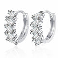 Emerald Cut Moissanite Huggie Hoop Earrings in Rhodium-Plated S925 sterling silver white background product photo showing the pair, stone shape, and huggie hoop earrings silhouette