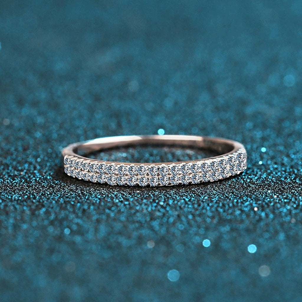 Round Moissanite Stackable Band Ring product view showing moissanite setting and metal finish