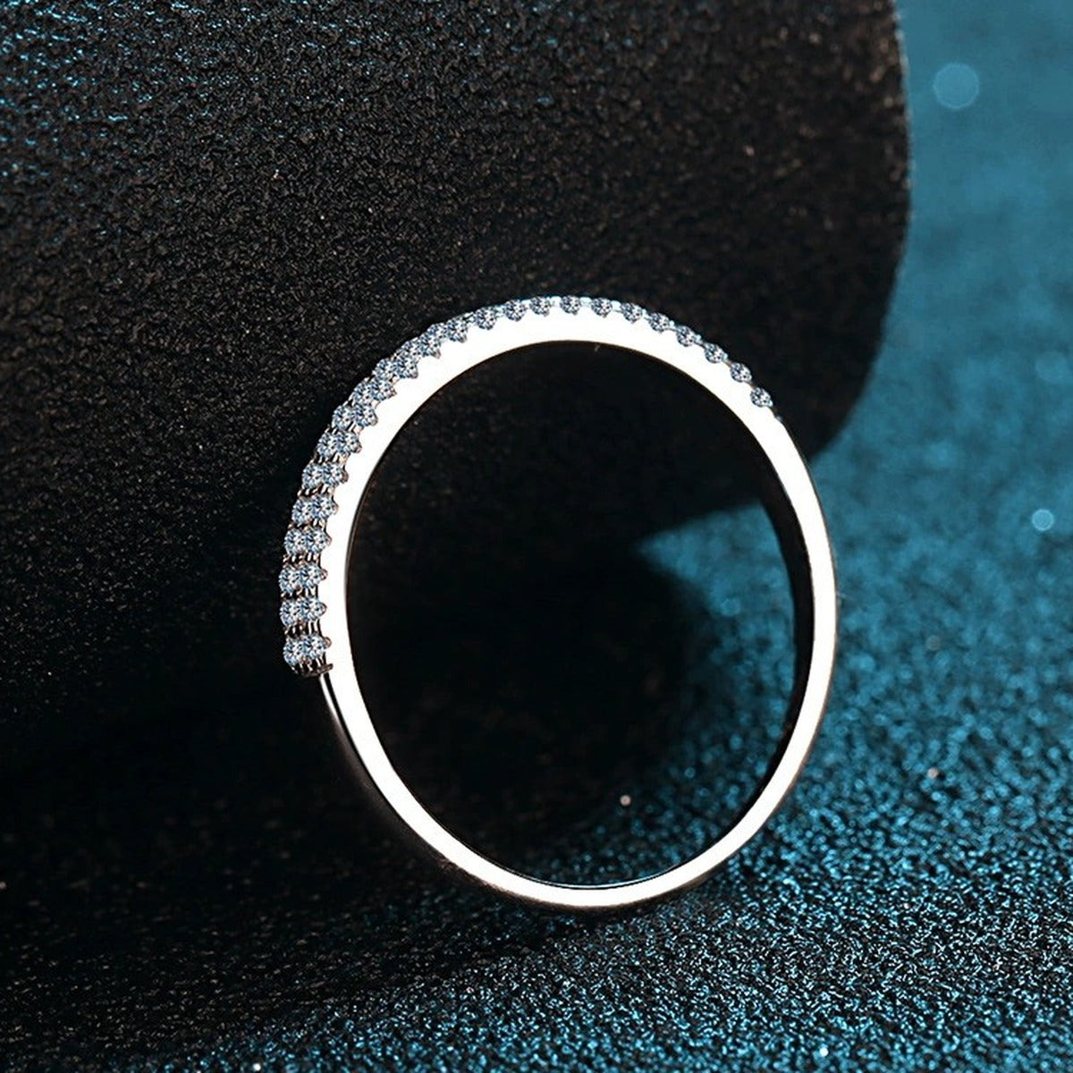 Round Moissanite Stackable Band Ring product view showing moissanite setting and metal finish