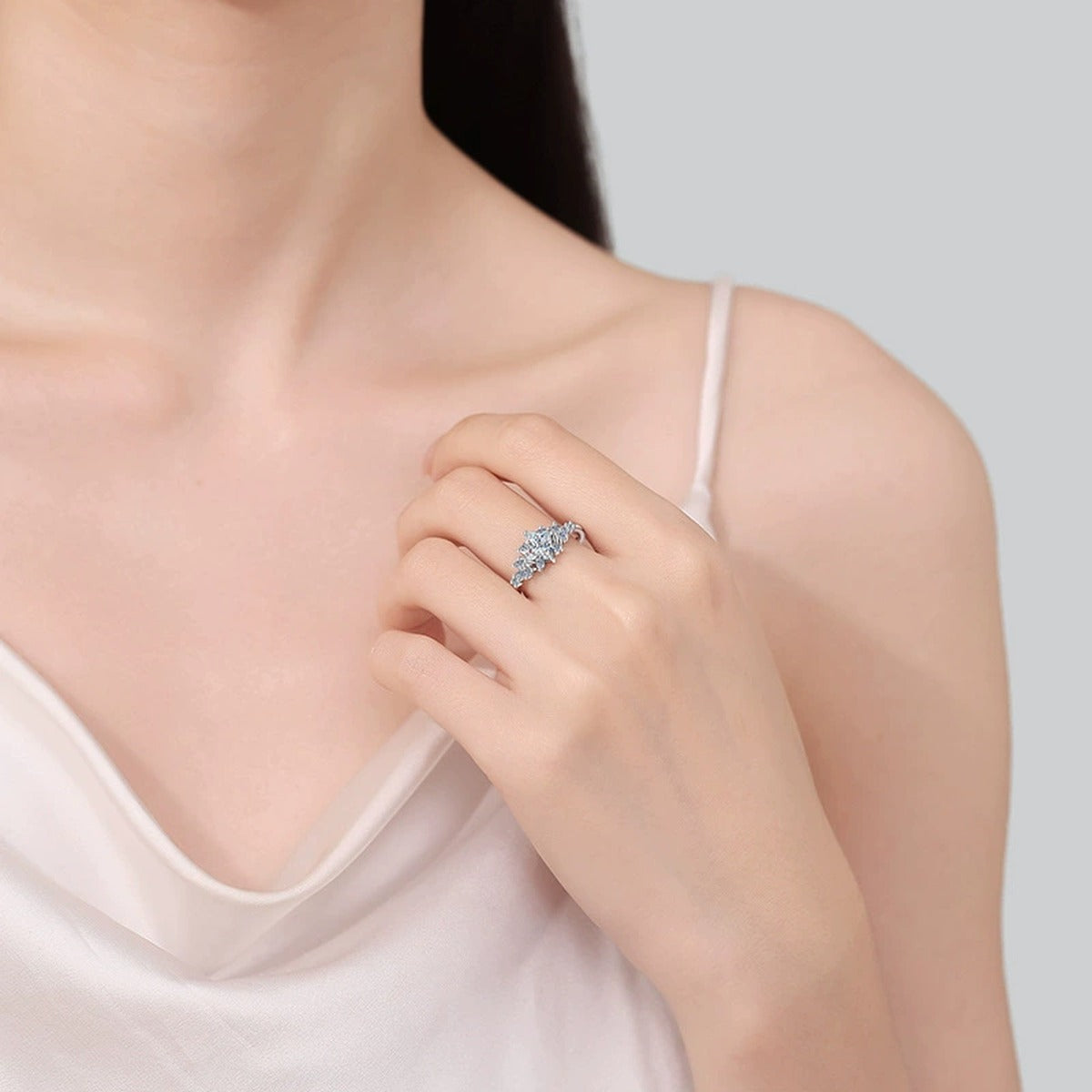 Princess Cut Moissanite Ring with CZ worn on hand to show scale, band width, and ring profile