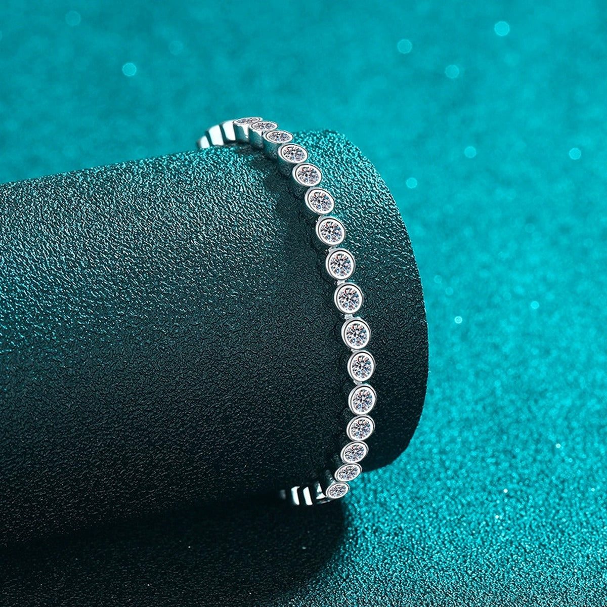 Beaded Round Moissanite Tennis Bracelet in Rhodium-Plated S925 sterling silver angled product display showing bracelet silhouette
