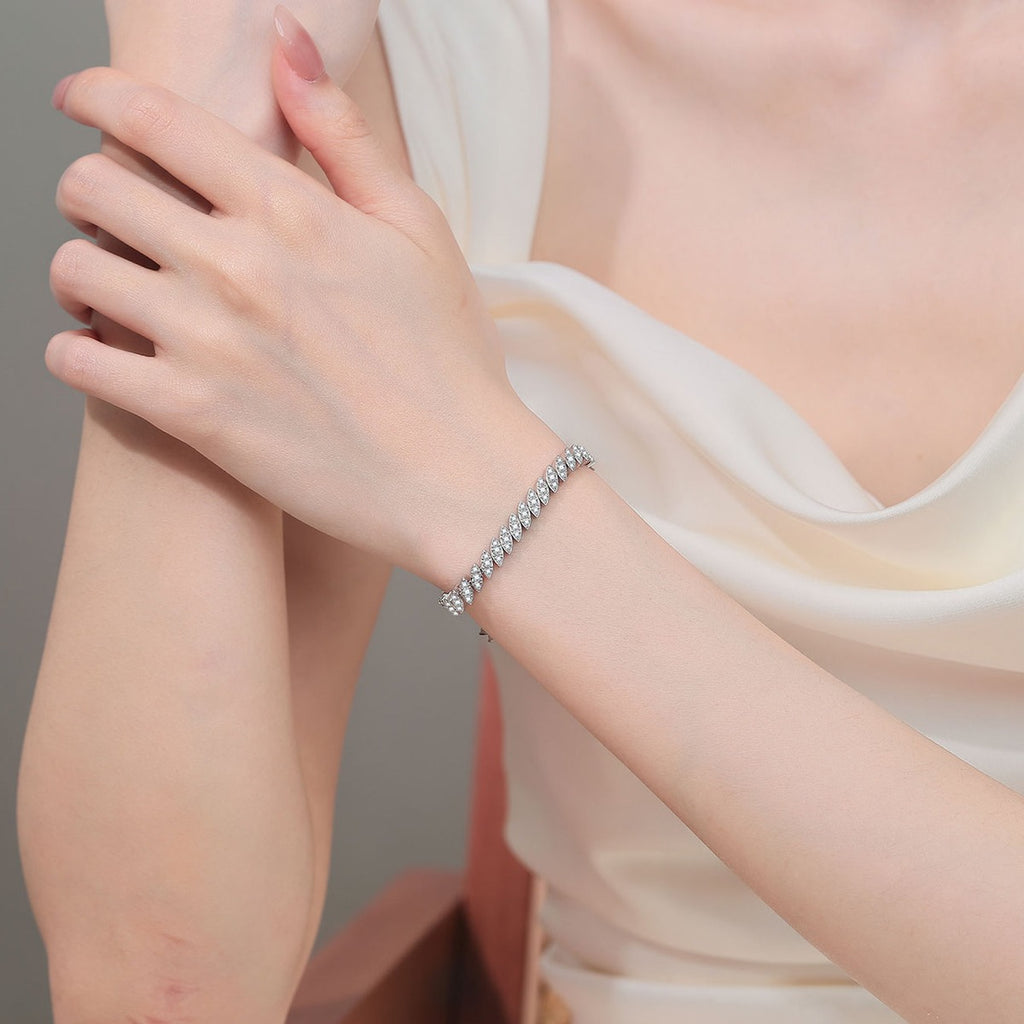 Leaf Moissanite Tennis Bracelet in Rhodium-Plated S925 sterling silver worn on wrist model view showing scale and adjustable fit