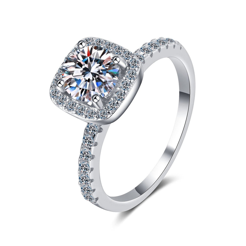 Cushion Halo Moissanite Ring with CZ in Rhodium-Plated S925 Sterling Silver clean white background product photo showing the ring silhouette and moissanite setting