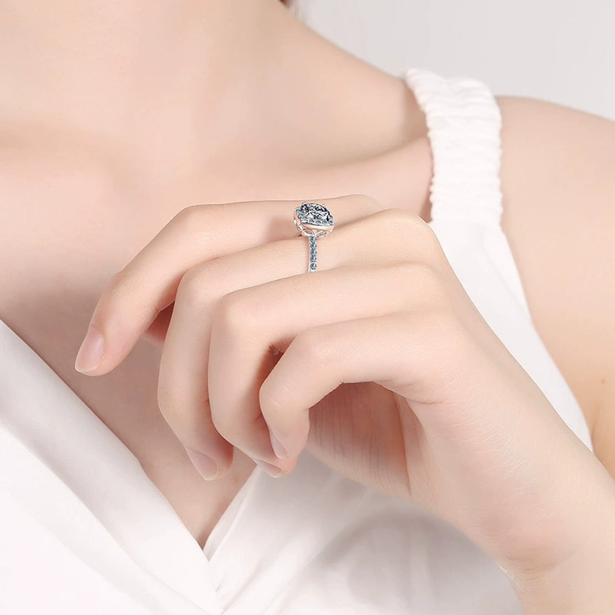 Cushion Halo Moissanite Ring with CZ in Rhodium-Plated S925 Sterling Silver worn on hand, showing scale, finger coverage, and rhodium-plated finish