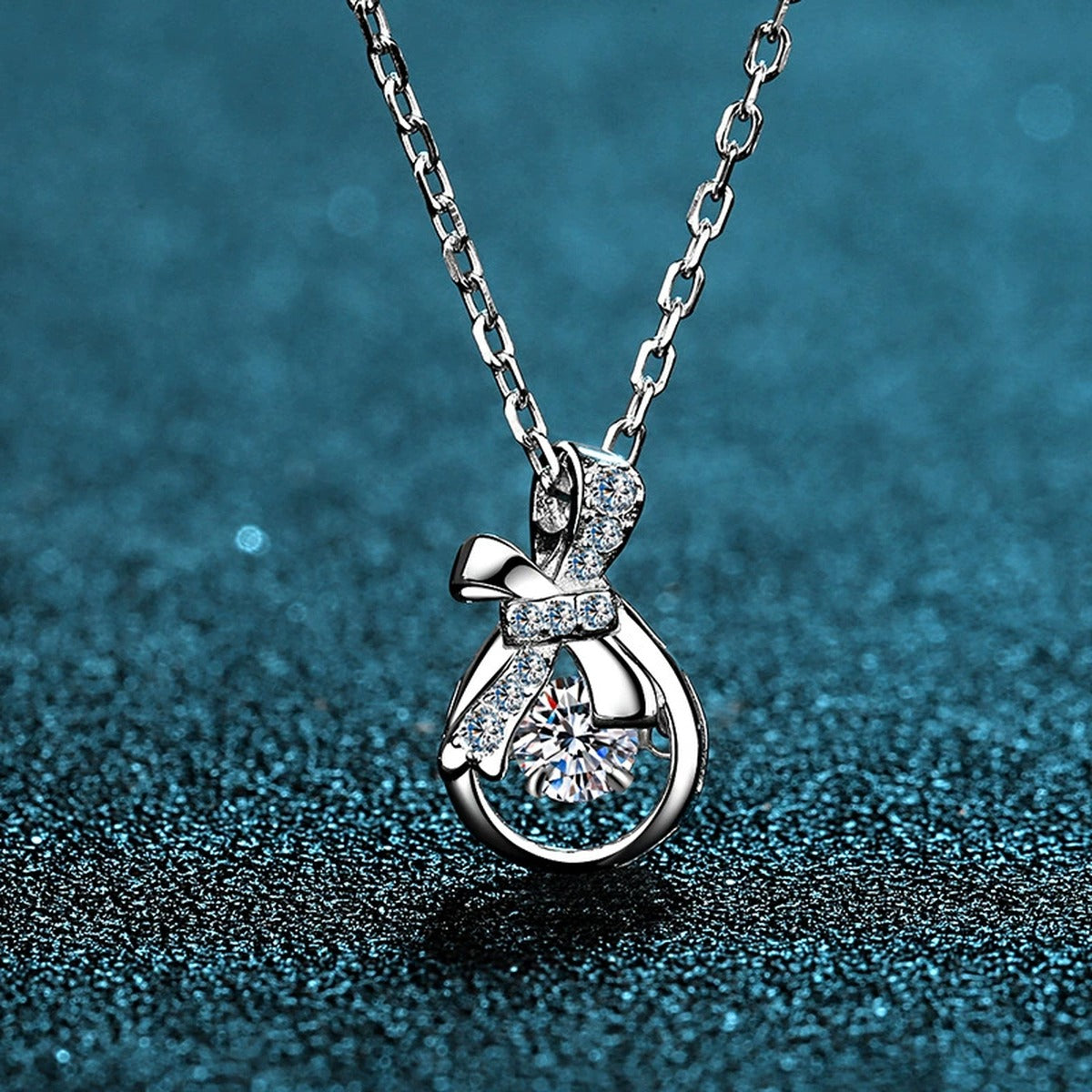 Ribbon Bow Moissanite Pendant Necklace with CZ in Rhodium-Plated S925 sterling silver product scene view showing chain and setting detail