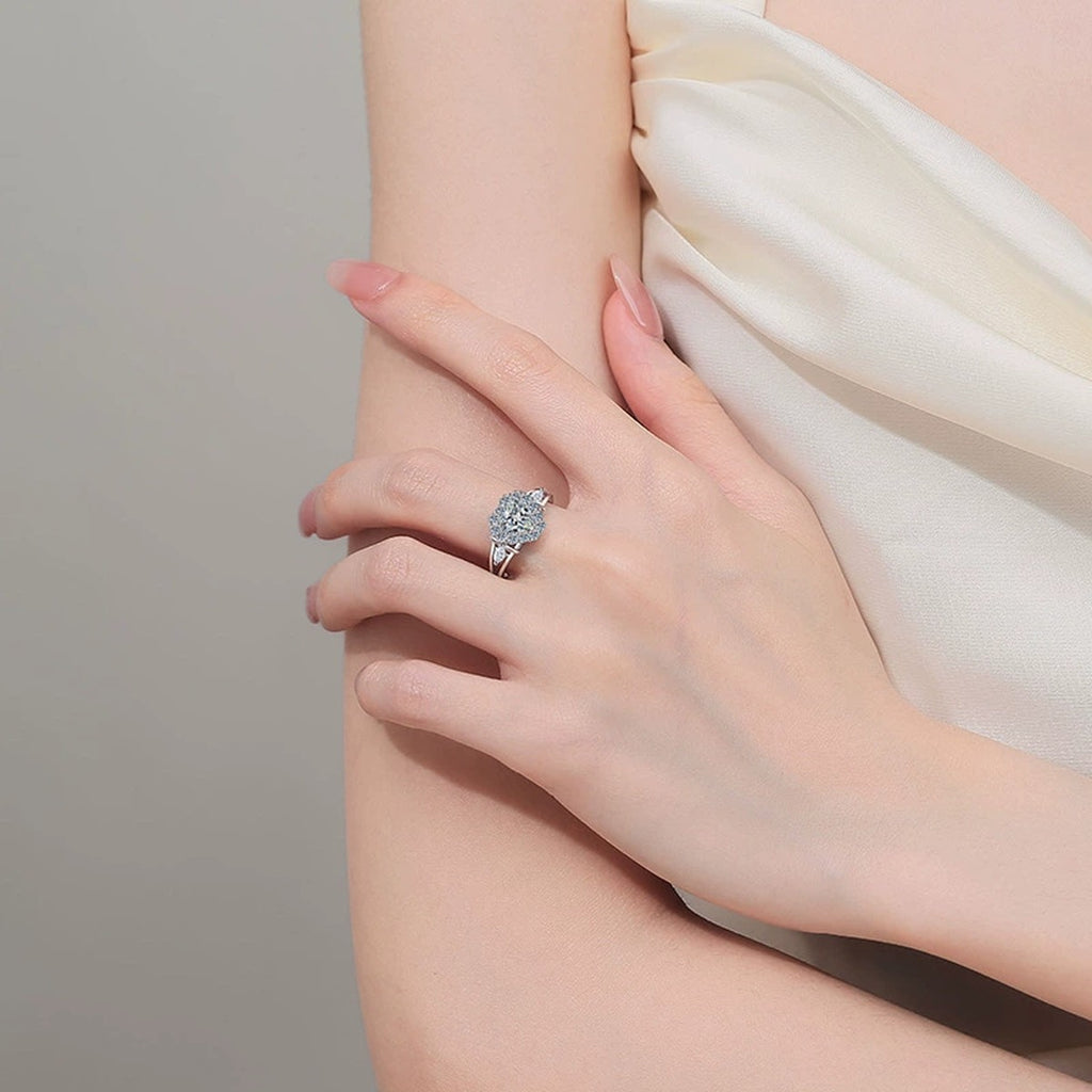 Heart Cut Moissanite Ring with CZ worn on hand to show scale, band width, and ring profile