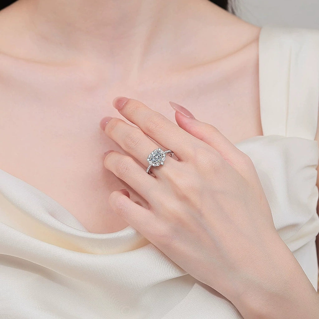 Heart Cut Moissanite Ring with CZ worn on hand to show scale, band width, and ring profile
