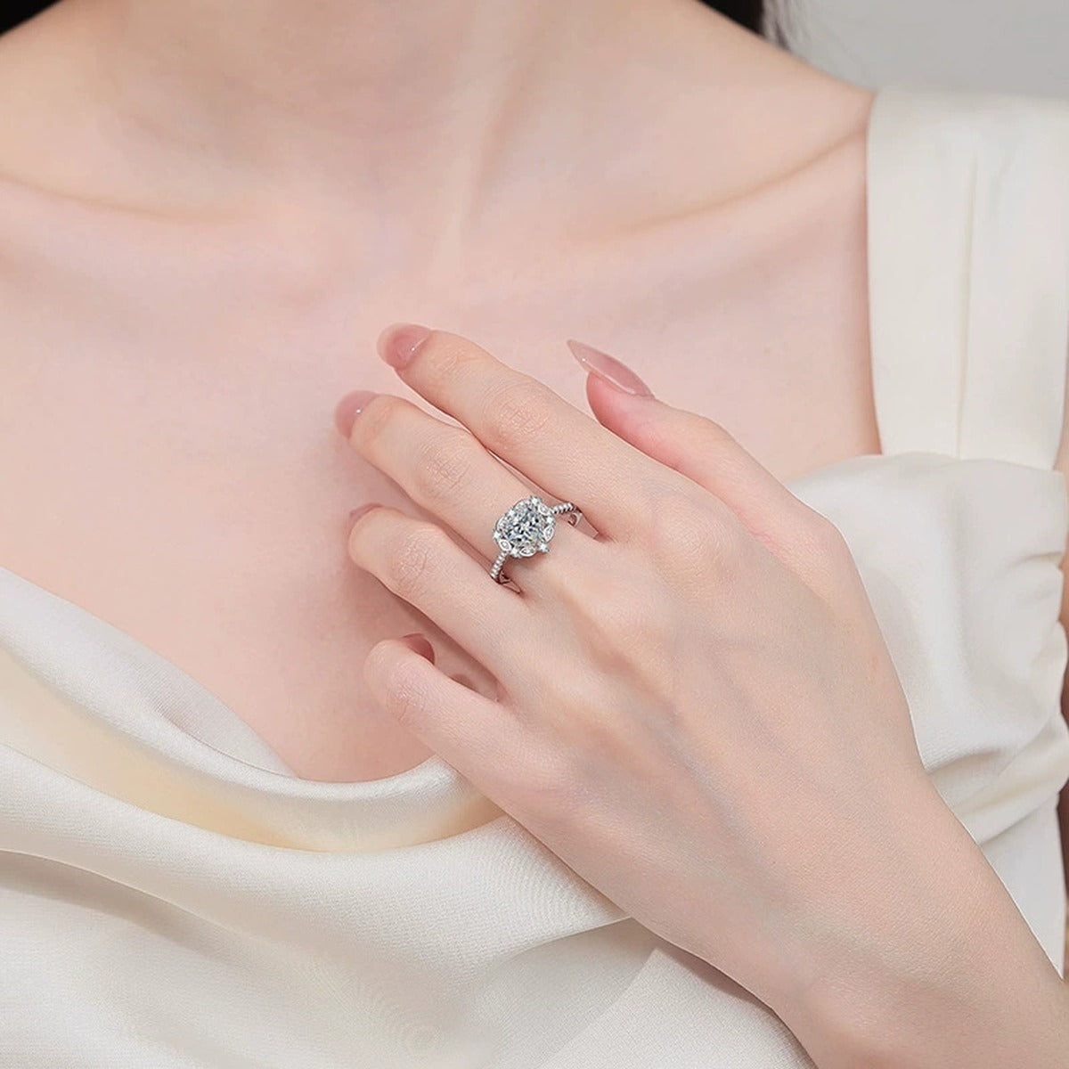 Heart Cut Moissanite Ring with CZ worn on hand to show scale, band width, and ring profile
