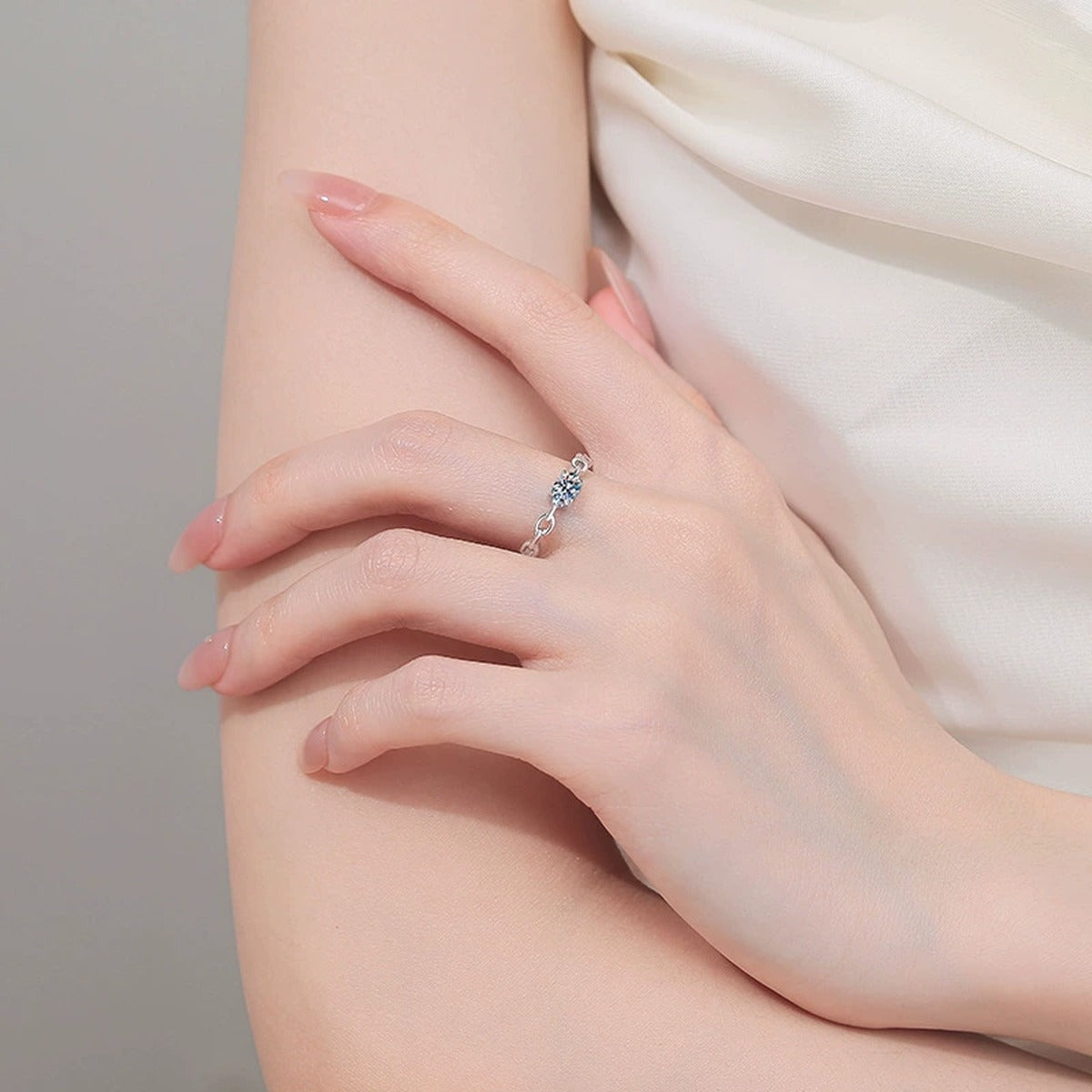 Oval Moissanite Stackable Ring worn on hand to show scale, band width, and ring profile