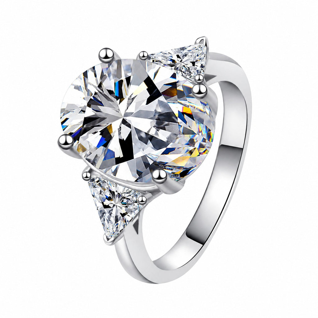 Oval and Radiant Moissanite Statement Ring in rhodium-plated S925 sterling silver on clean white background