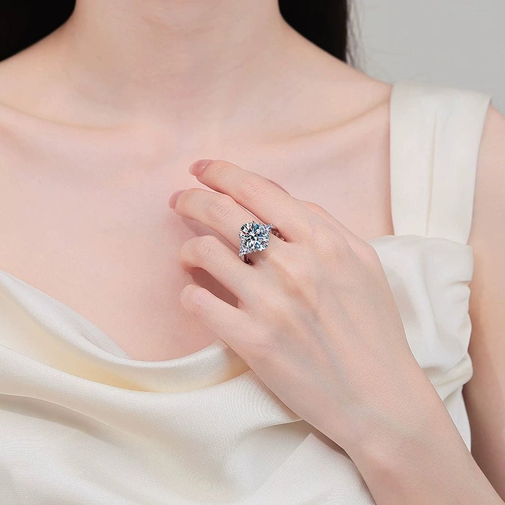 Oval and Radiant Moissanite Statement Ring worn on hand to show scale, band width, and ring profile