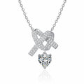 Heart Bow Moissanite Pendant Necklace with CZ in Rhodium-Plated S925 sterling silver white background product photo showing bow and heart pendant with a heart cut moissanite drop and CZ ribbon detail