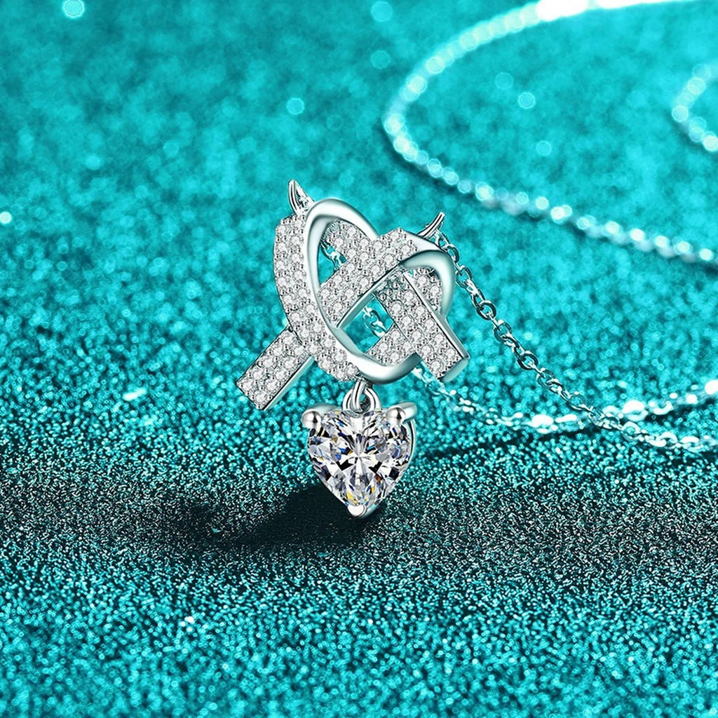 Heart Bow Moissanite Pendant Necklace with CZ in Rhodium-Plated S925 sterling silver blue display scene showing chain and stone layout