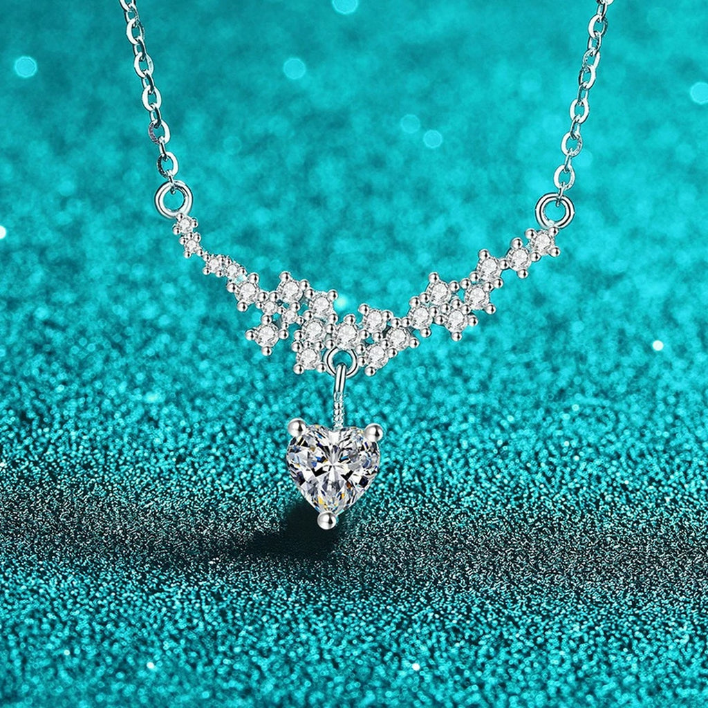 Heart Bow Moissanite Pendant Necklace with CZ in Rhodium-Plated S925 sterling silver blue display scene showing chain and stone layout
