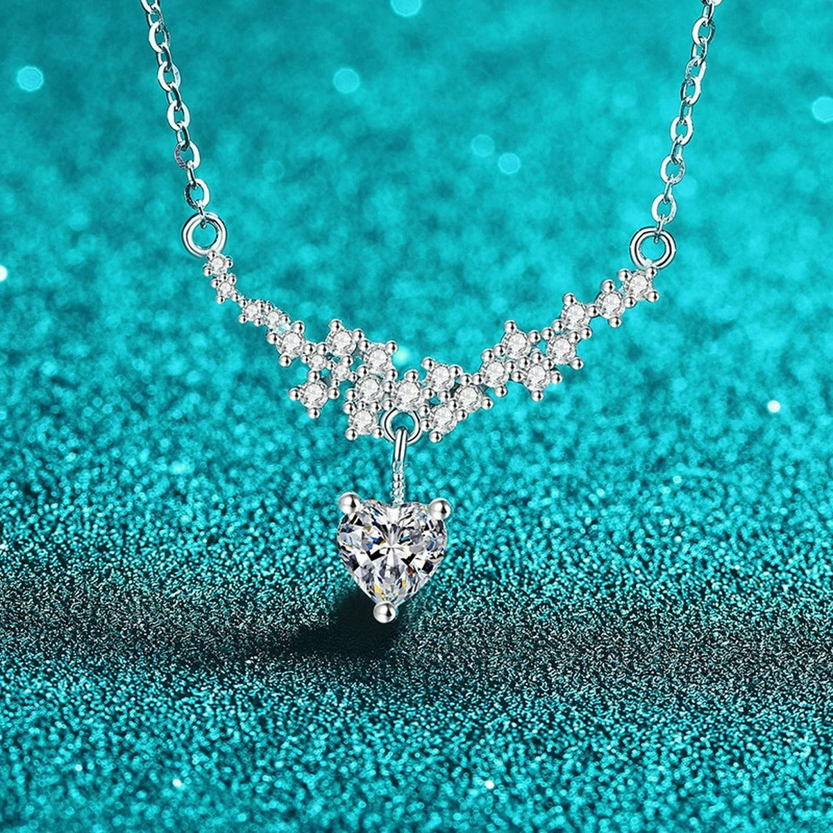 Heart Bow Moissanite Pendant Necklace with CZ in Rhodium-Plated S925 sterling silver blue display scene showing chain and stone layout