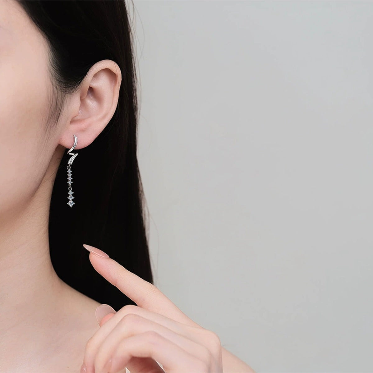 Linear Moissanite Stud Dangle Earrings with CZ in Rhodium-Plated S925 sterling silver worn on ear by model showing scale, placement, and stud dangle earrings styling