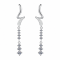 A pair of silver-toned dangle earrings with curved top hooks, pavé-set clear stones, and three dangling floral starburst clusters on a plain white background.