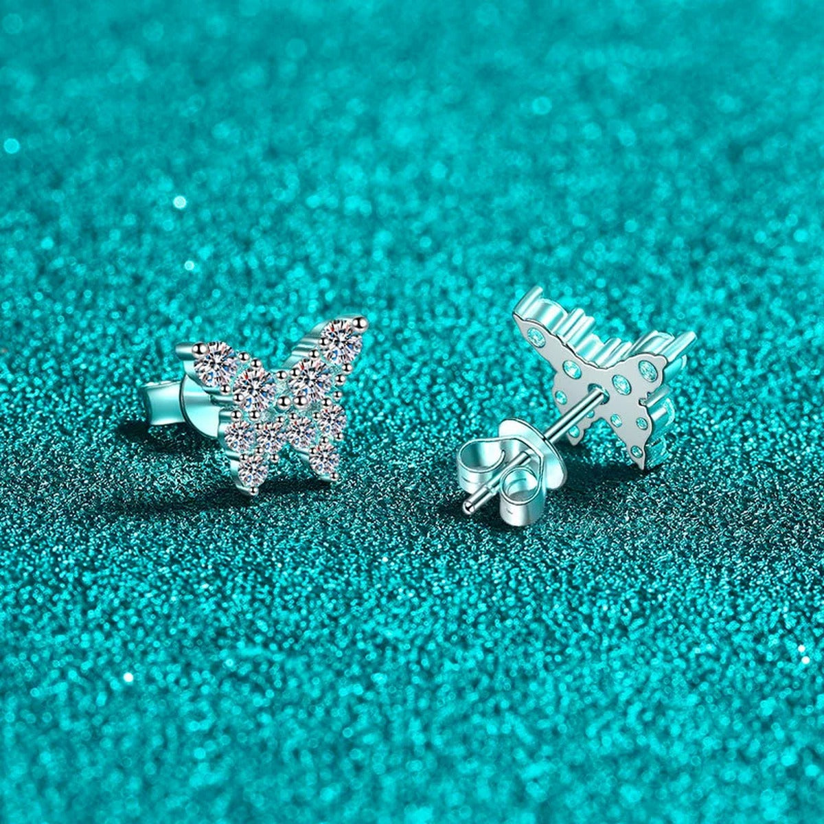 Butterfly Moissanite Stud Earrings in Rhodium-Plated S925 sterling silver product scene view showing front sparkle