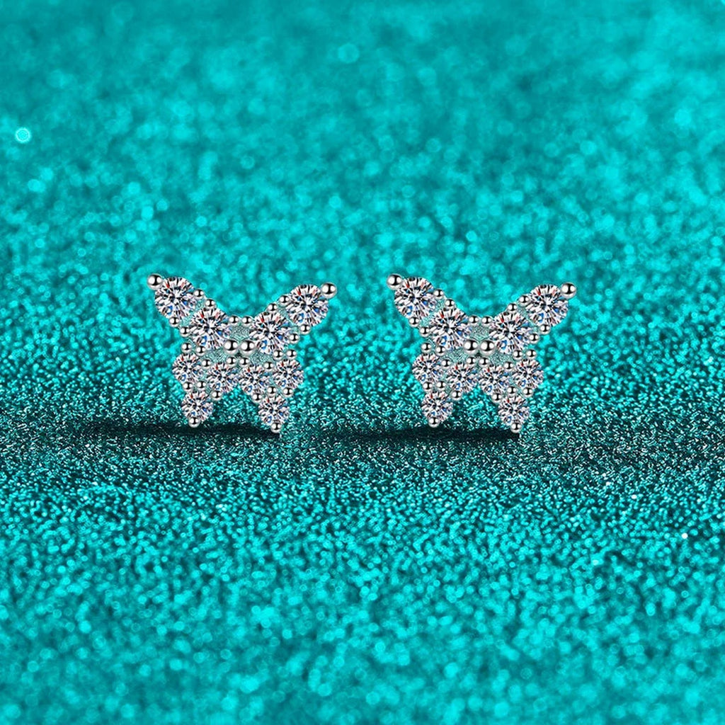 Butterfly Moissanite Stud Earrings in Rhodium-Plated S925 sterling silver product scene view showing angled setting detail