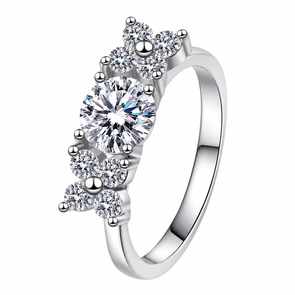 Round Moissanite Ring with CZ in rhodium-plated S925 sterling silver on clean white background