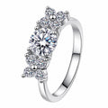 Round Moissanite Ring with CZ in rhodium-plated S925 sterling silver on clean white background