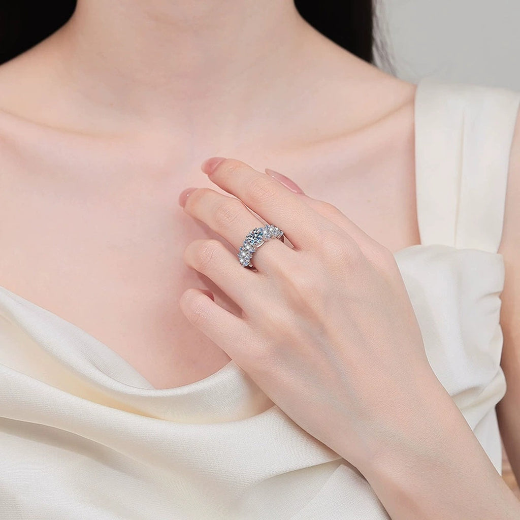 Round Moissanite Ring with CZ worn on hand to show scale, band width, and ring profile