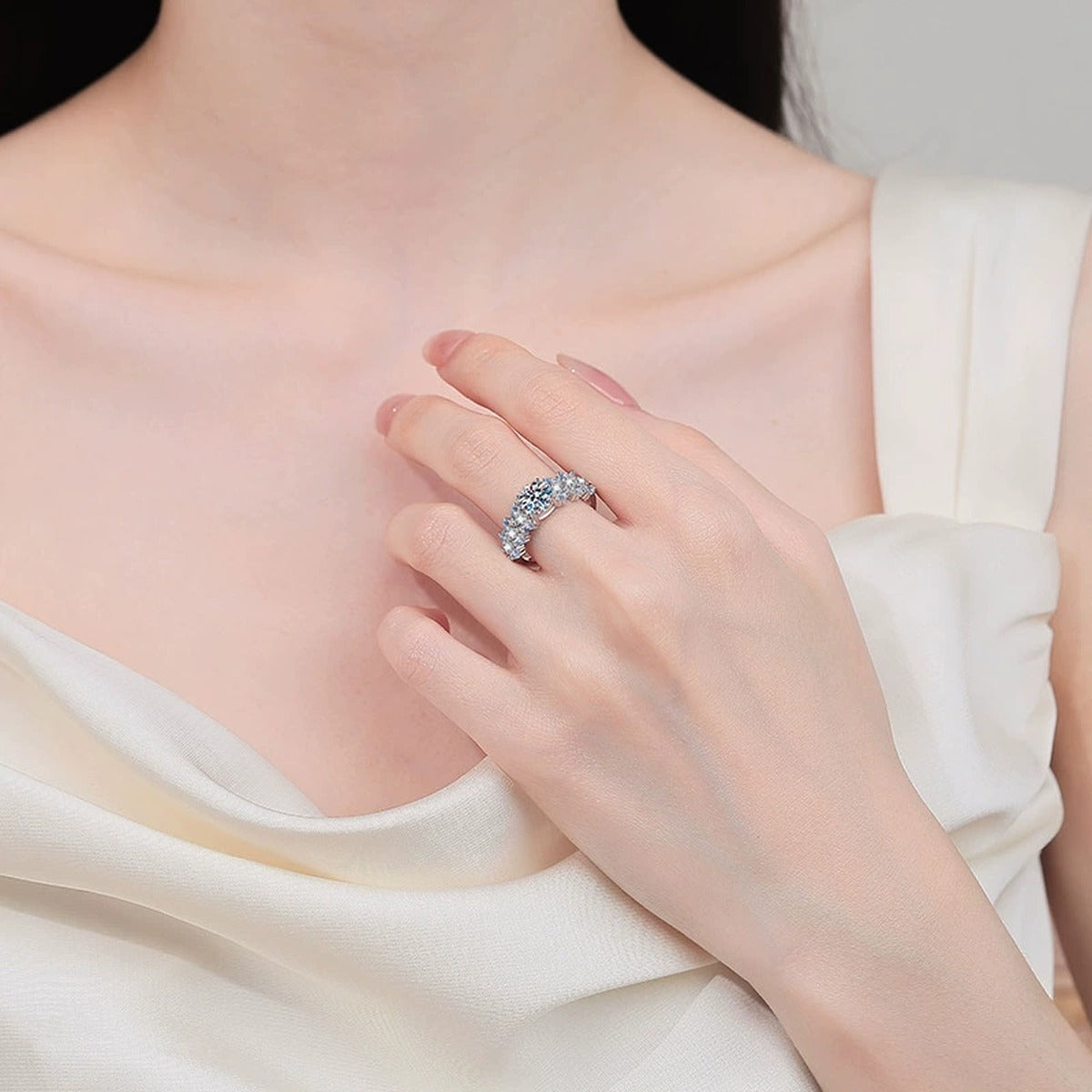Round Moissanite Ring with CZ worn on hand to show scale, band width, and ring profile