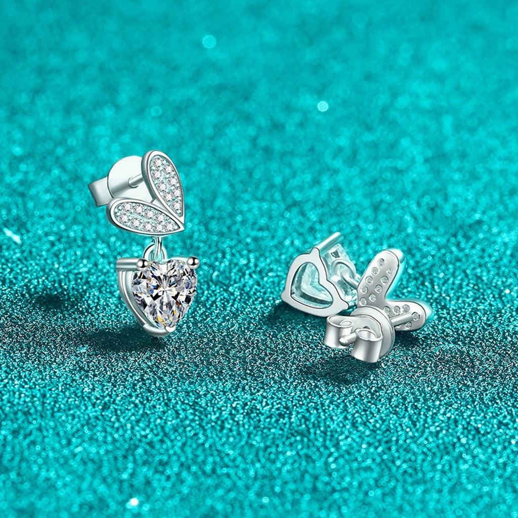 Heart Moissanite Stud Dangle Earrings with CZ in Rhodium-Plated S925 sterling silver product scene view showing angled setting detail