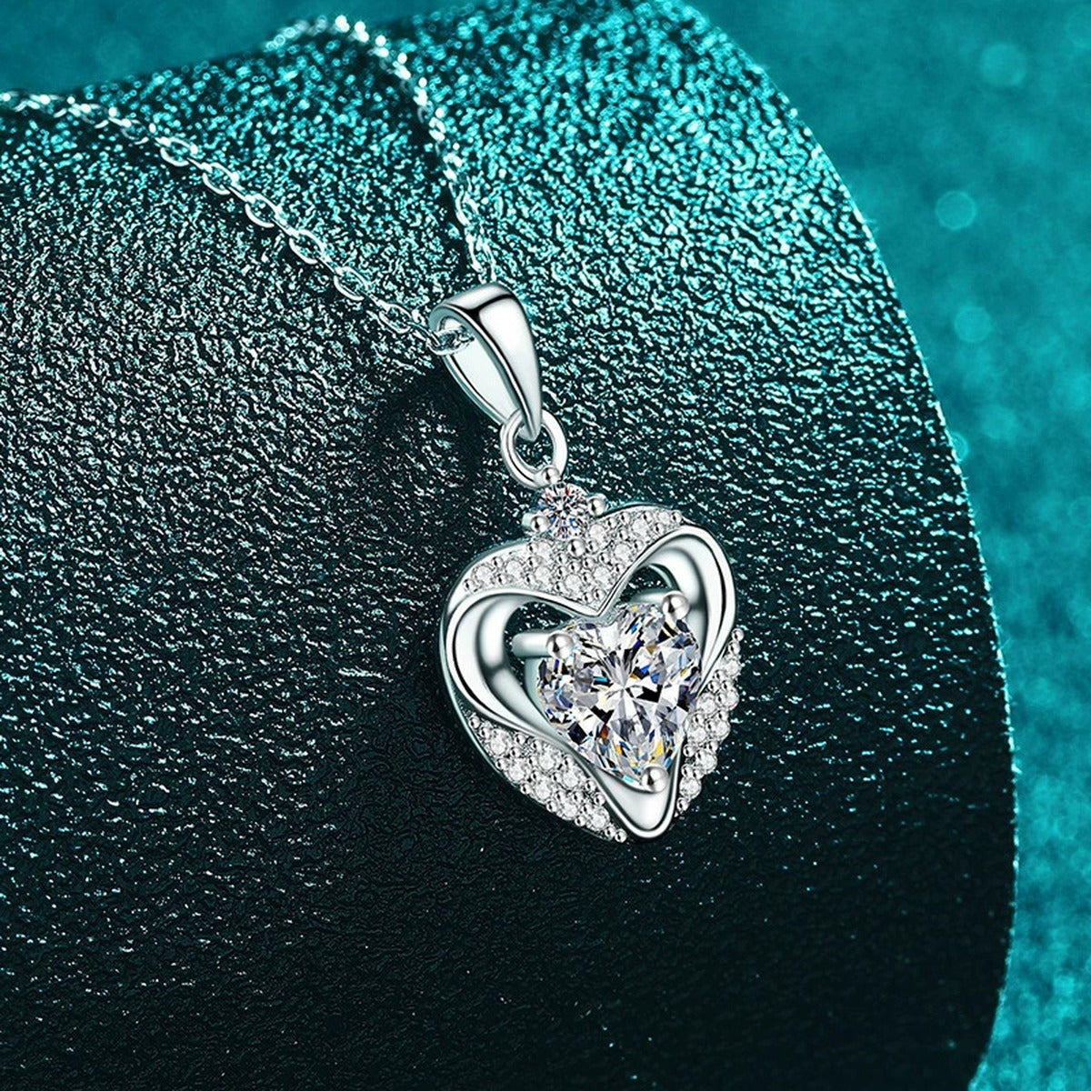 Open Heart Moissanite Pendant Necklace with CZ in Rhodium-Plated S925 sterling silver blue display scene showing chain and stone layout