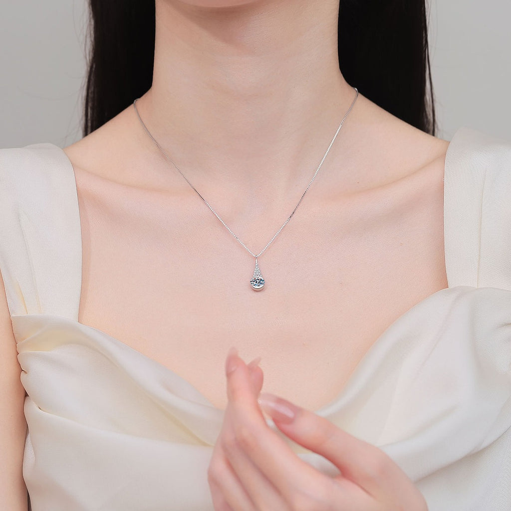Oval Teardrop Moissanite Pendant Necklace with CZ in Rhodium-Plated S925 sterling silver neckline model view showing pendant scale and adjustable chain