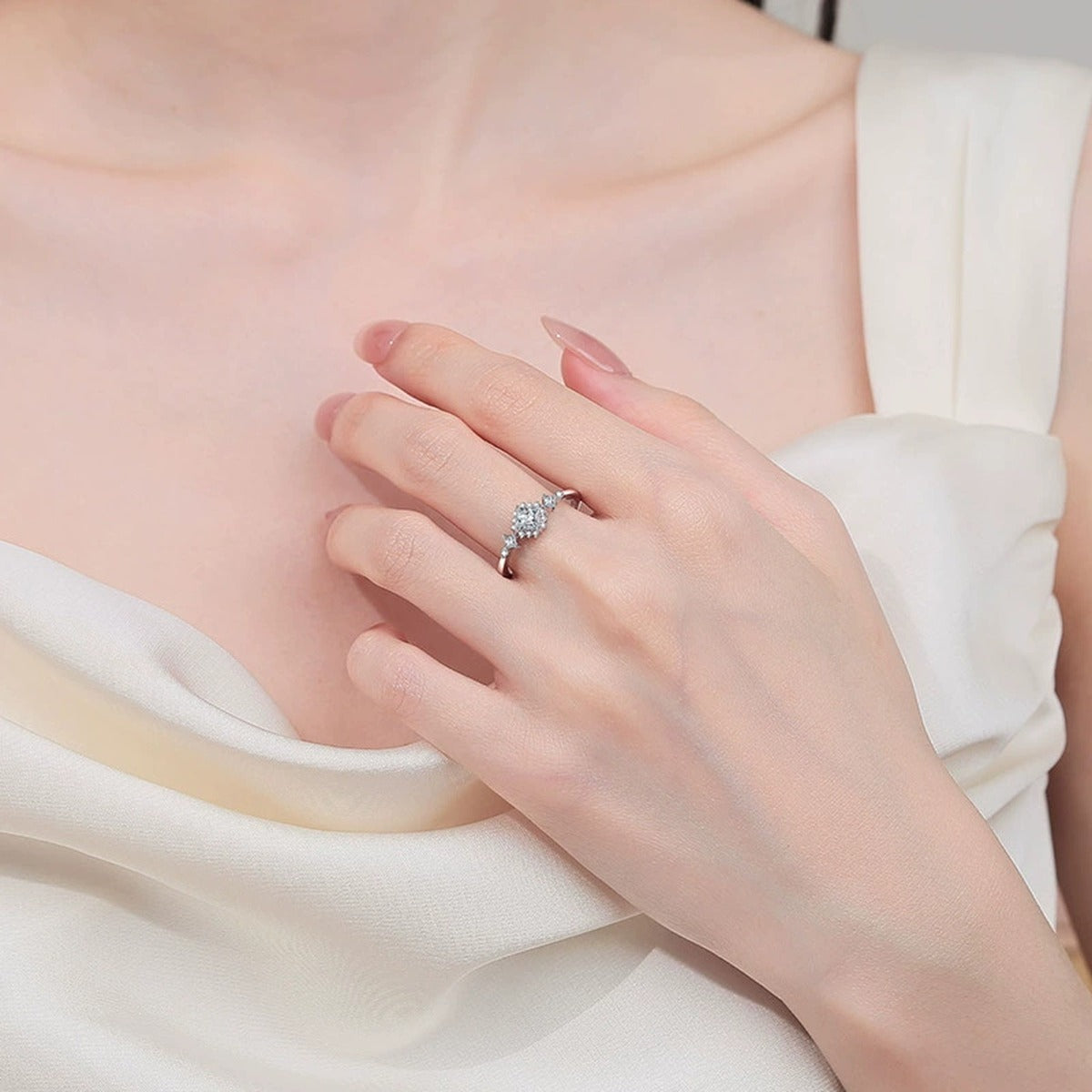 Princess Cut Moissanite Ring with CZ worn on hand to show scale, band width, and ring profile