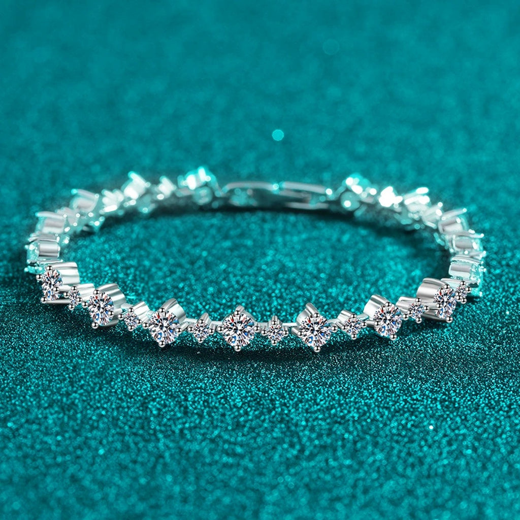 Mixed-Size Round Moissanite Tennis Bracelet in Rhodium-Plated S925 sterling silver styled product scene showing stone sparkle and chain detail