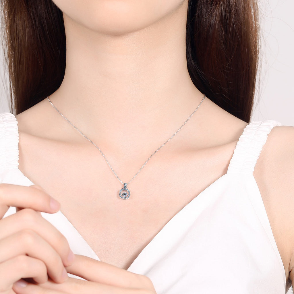 Square Lock Moissanite Pendant Necklace with CZ in Rhodium-Plated S925 sterling silver worn on neckline by model showing scale and adjustable chain styling