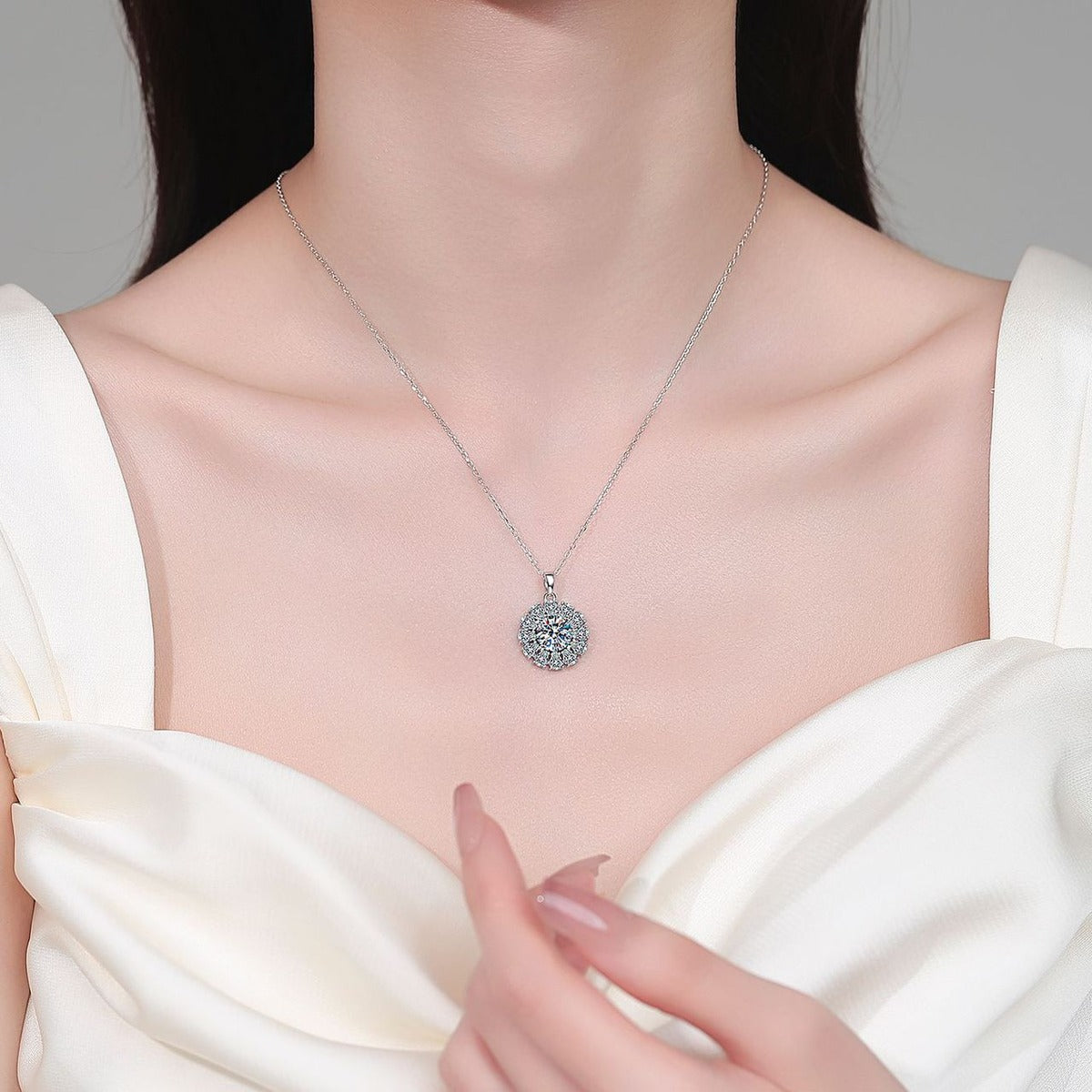 Round Sunburst Moissanite Pendant Necklace with CZ in Rhodium-Plated S925 sterling silver neckline model view showing pendant scale and adjustable chain