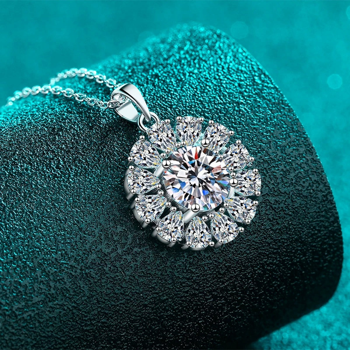 Round Sunburst Moissanite Pendant Necklace with CZ in Rhodium-Plated S925 sterling silver blue display scene showing chain and stone layout