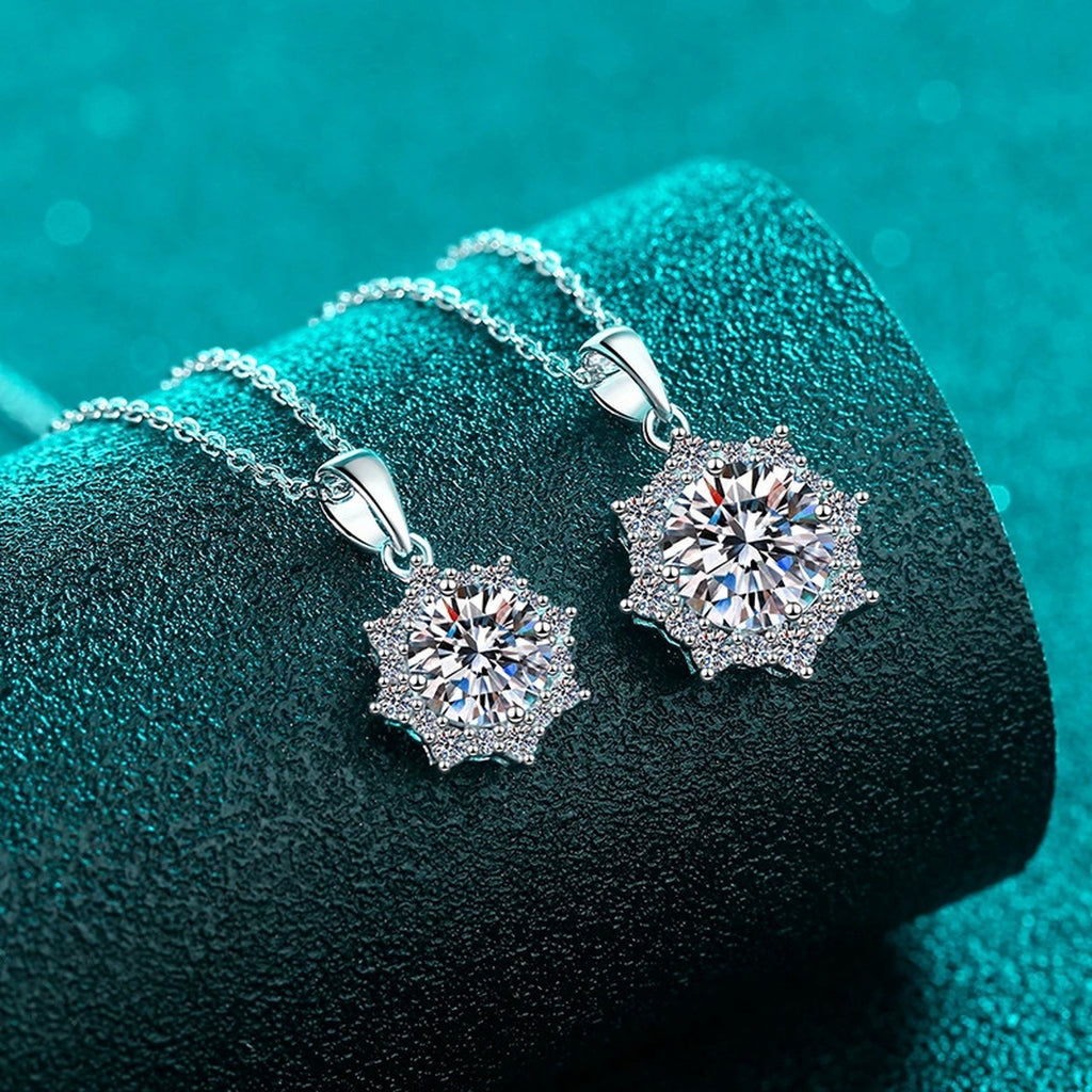 Sunburst Round Moissanite Pendant Necklace with CZ in Rhodium-Plated S925 sterling silver blue display scene showing chain and stone layout