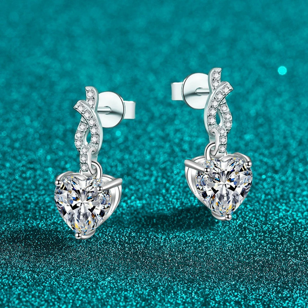 Heart Moissanite Stud Dangle Earrings with CZ in Rhodium-Plated S925 sterling silver product scene view showing angled setting detail