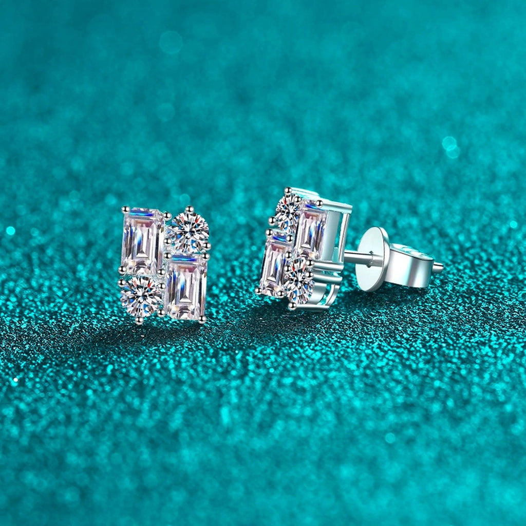 Emerald and Round Moissanite Stud Earrings in Rhodium-Plated S925 sterling silver product scene view showing angled setting detail