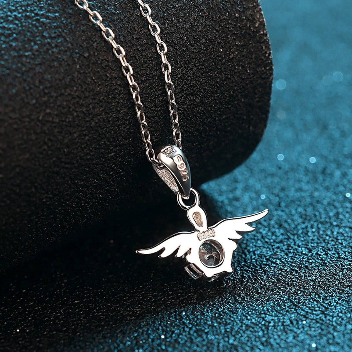 Angel Wing Moissanite Pendant Necklace in Rhodium-Plated S925 sterling silver product scene view showing pendant detail