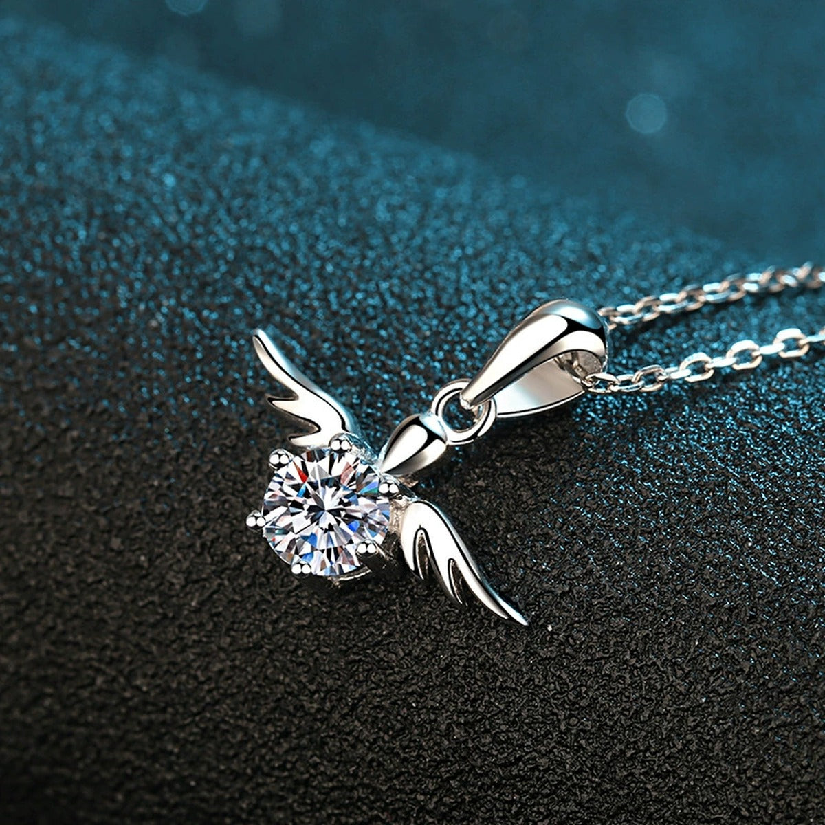 Angel Wing Moissanite Pendant Necklace in Rhodium-Plated S925 sterling silver product scene view showing chain and setting detail