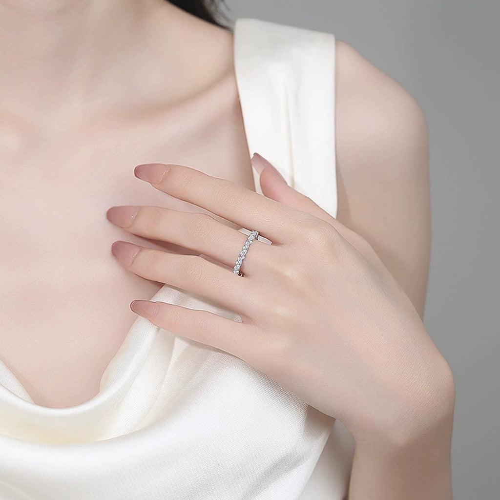 Marquise and Round Moissanite Band Ring worn on hand to show scale, band width, and ring profile