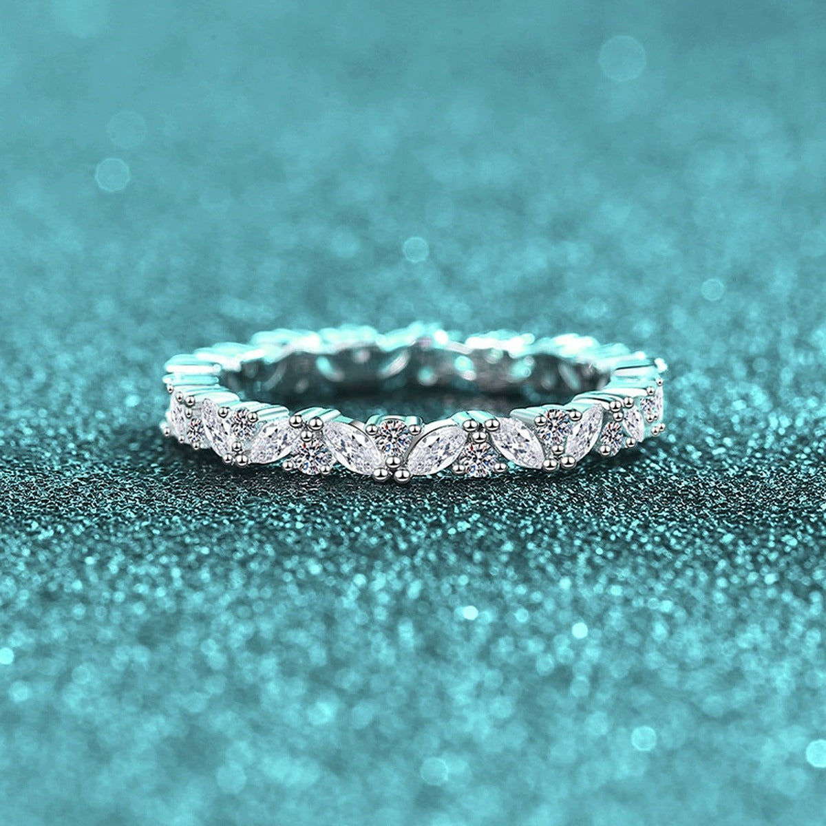 Marquise and Round Moissanite Band Ring product view showing moissanite setting and metal finish