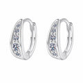 Pave Moissanite Huggie Hoop Earrings in Rhodium-Plated S925 sterling silver white background product photo showing the pair, stone shape, and huggie hoop earrings silhouette