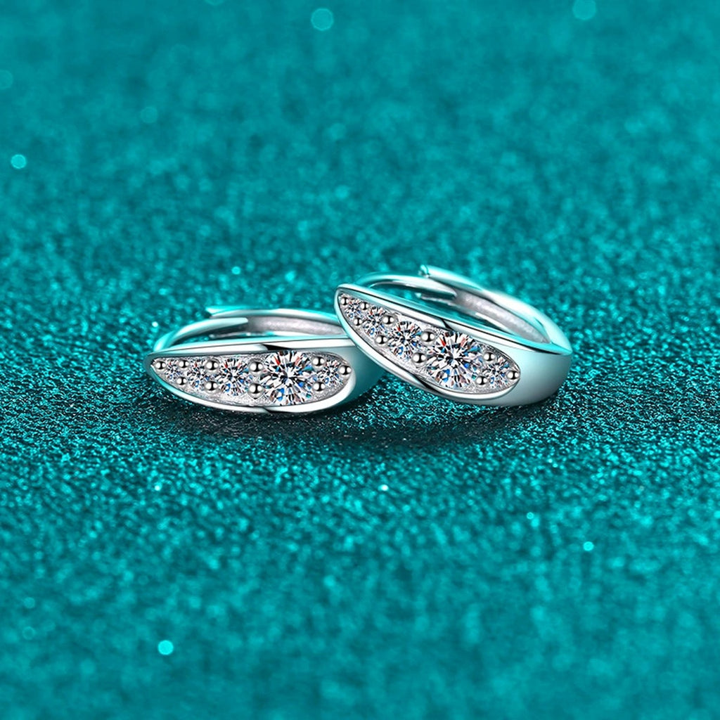 Pave Moissanite Huggie Hoop Earrings in Rhodium-Plated S925 sterling silver product scene view showing angled setting detail